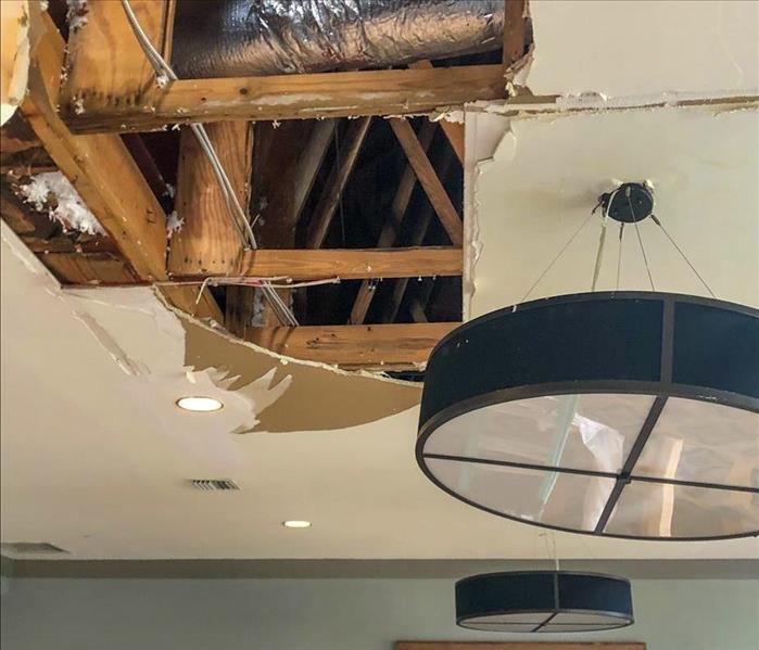 Water damage in the ceiling of a Nashville business due to a storm
